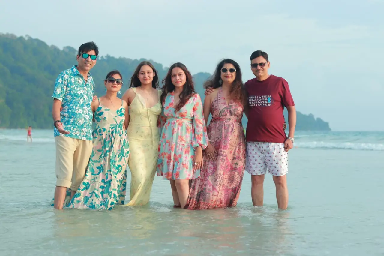 A family enjoying on Radhanagar Beach, Andaman