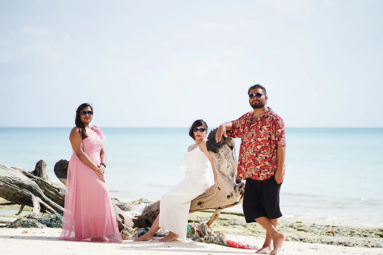 3 friends enjoying on beach.