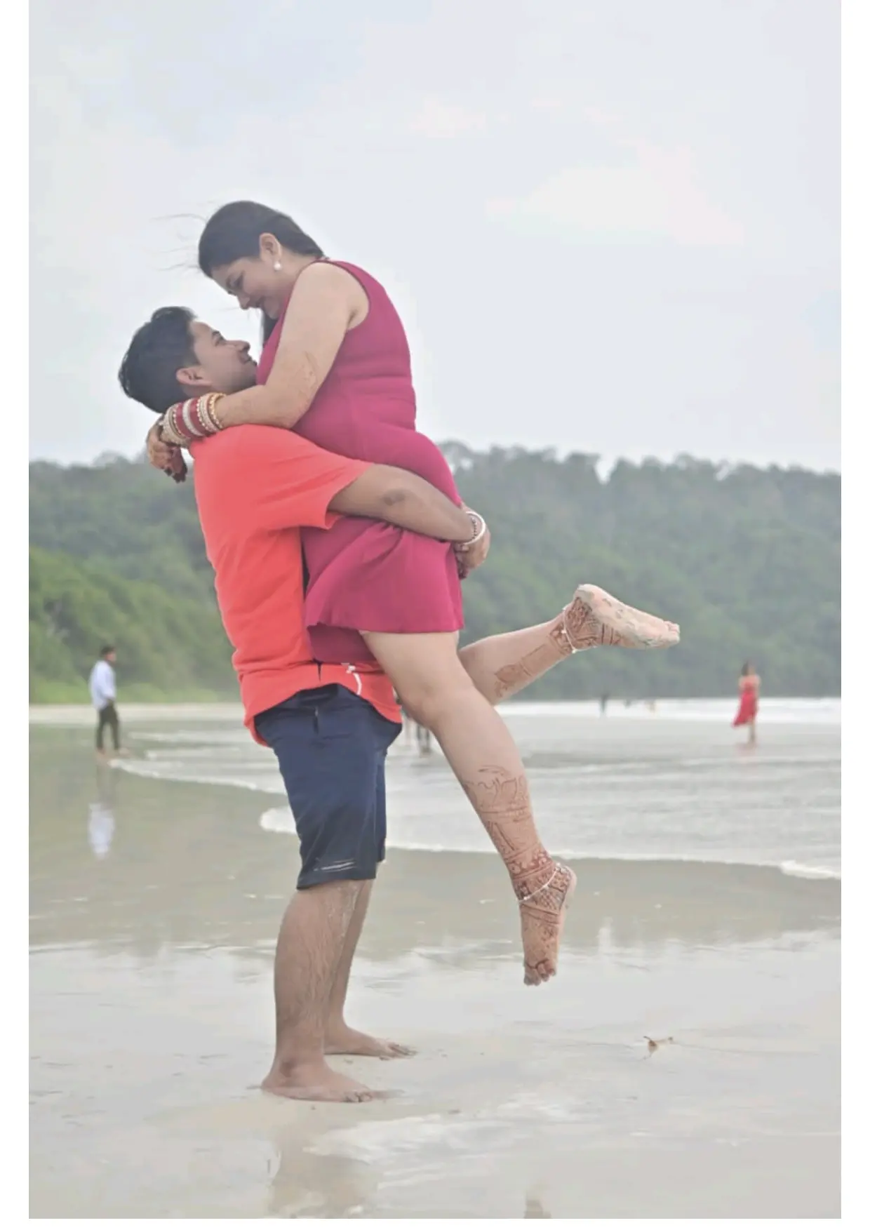 Honeymoon couple enjoying on Radhanagar beach, Havelock island, Andaman.