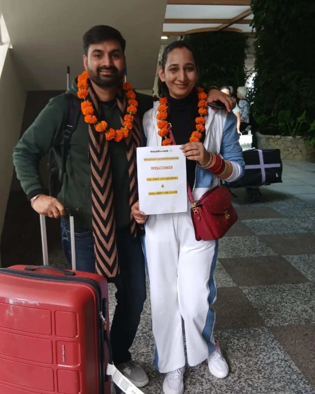Honeymoon couple welcomed at Bali Denpasar International Airport.